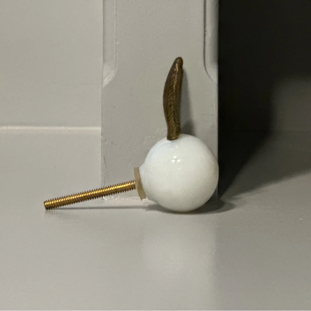 Anthropologie White Ceramic Knob with Gold Bunny Ears